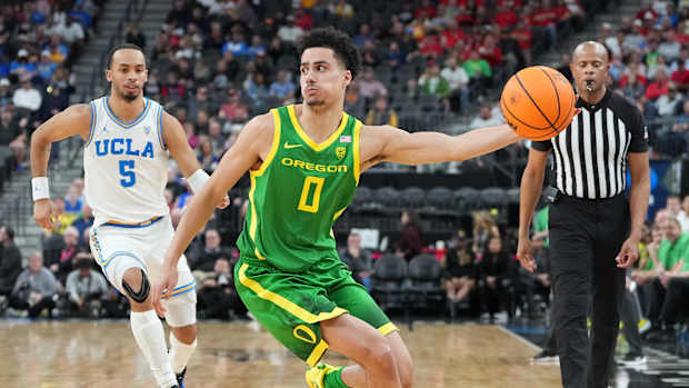 Oregon Ducks guard Will Richardson grabs the basketball.